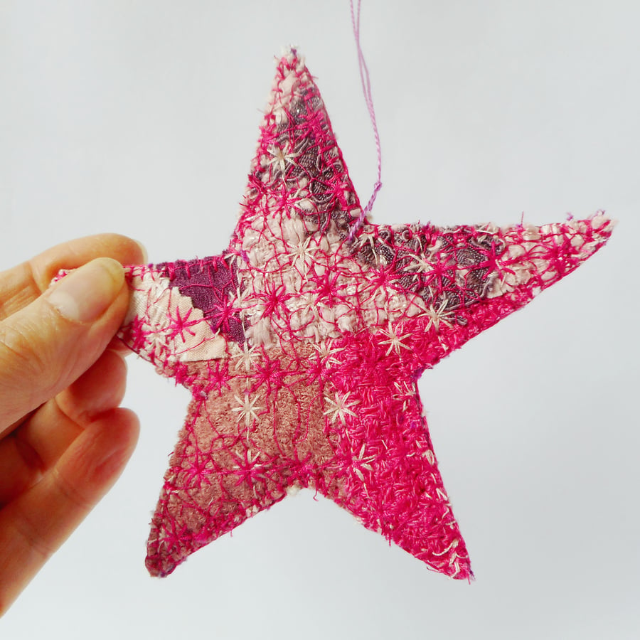 Hanging ornament, embroidered large star in mixed textiles 