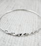 Sterling Silver Bangle with Twist and Crosshatch Pattern. Size Small 19cm  - Image 2