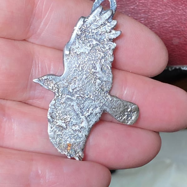 Raw silver flying crow 