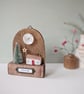 Festive Wooden Cottage Scene with Star and Moon - Image 4