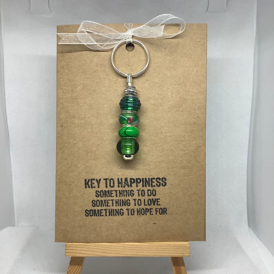 A hand made keyring attached to an A6 hand stamped greetings card.