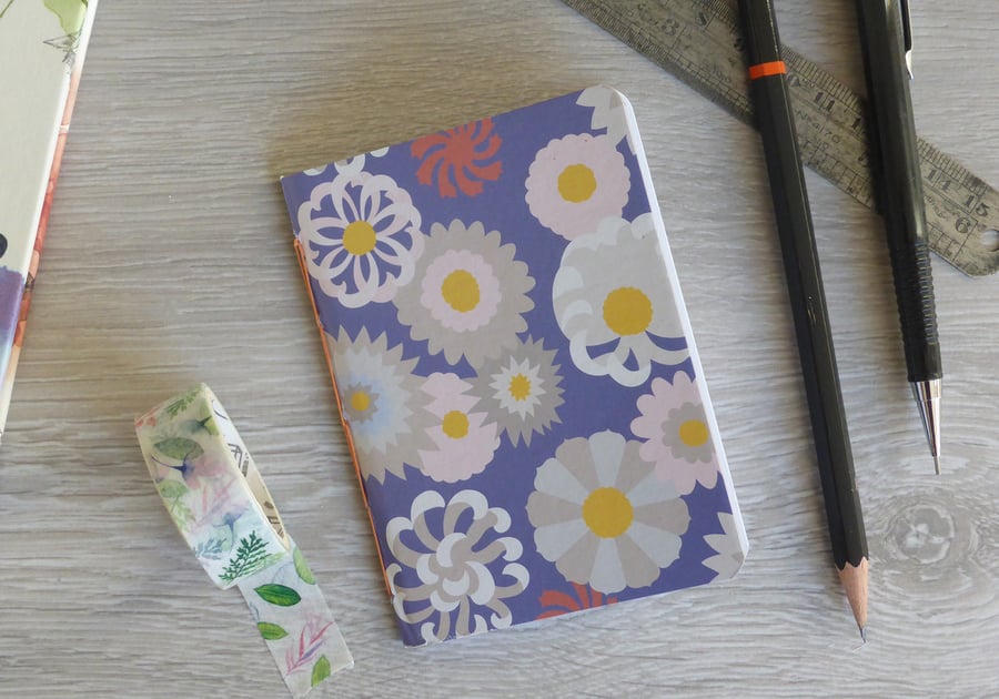 Small hand bound A7 notebook or sketchbook with modern floral patterned cover