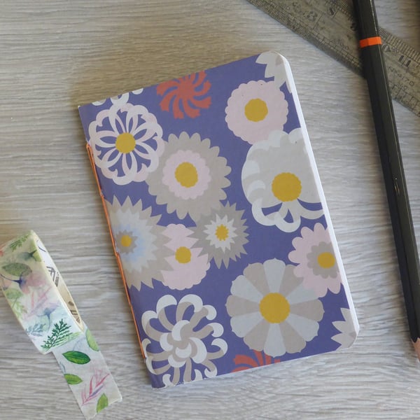 Small hand bound A7 notebook or sketchbook with modern floral patterned cover