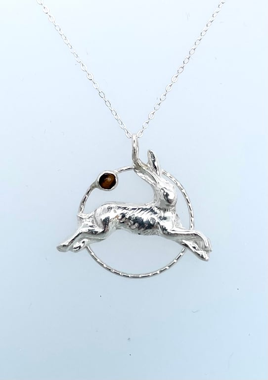 Silver leaping hare pendant with tigers eye