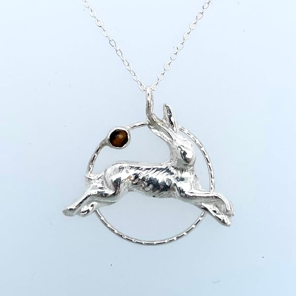 Silver leaping hare pendant with tigers eye