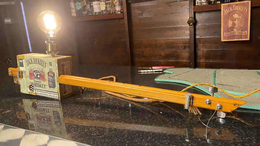 JD Cigar box guitar Up-cycled to a vintage style lamp Hung or free standing.