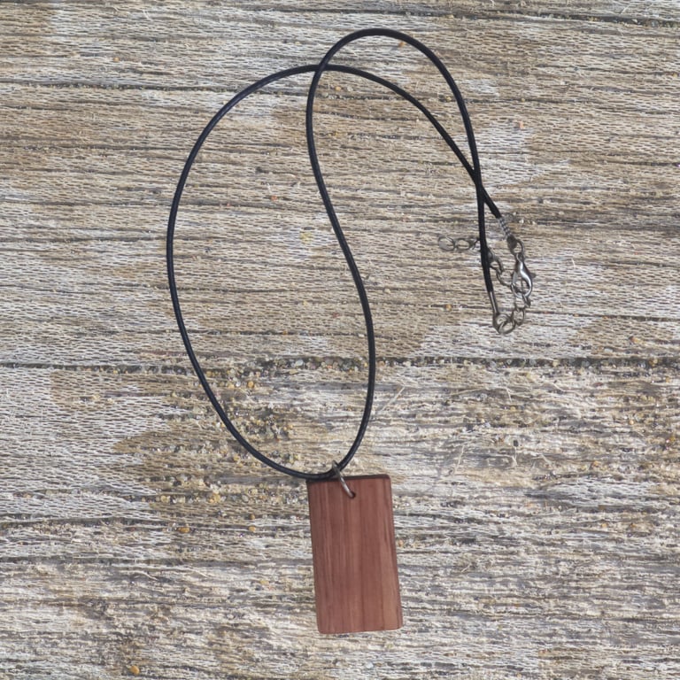 Handmade wooden pendant is crafted from reclaimed teak