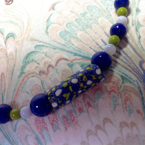 Necklace with a large blue millefiori African trade beads 