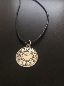 clock charm pendant on a 18" leather cord necklace