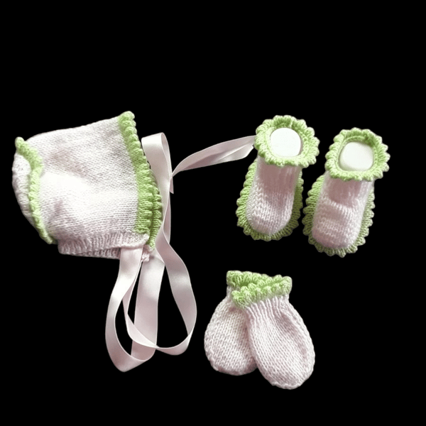 Hand knitted pink and green baby bonnet booties and mittens set 