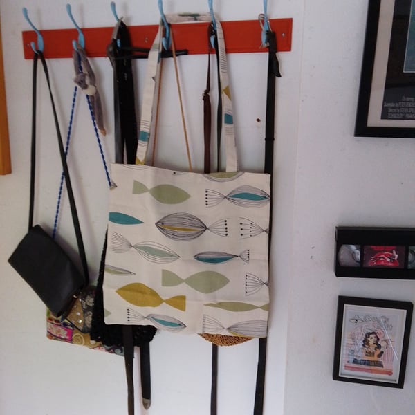 Tote bag made from cream fabric with fish design