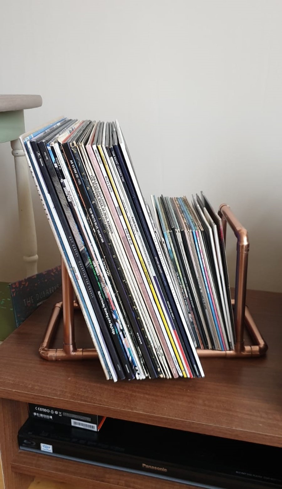 Copper pipe record holder