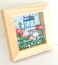 Fabric picture of houses and flowers, in a small wooden frame - Image 3