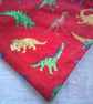 Brightly Coloured Dinosaurs on Red Dribble Bib - Image 4