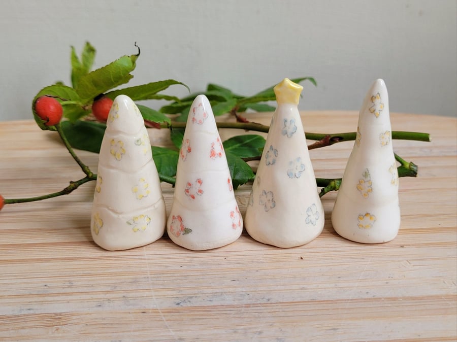 Little pottery Christmas tree with flowers - handmade ceramic cake topper. 