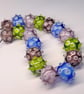 Handmade multicoloured patterned lamp work glass beads - Image 5