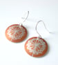 Dandelion clock earrings in orange and silver - Image 1