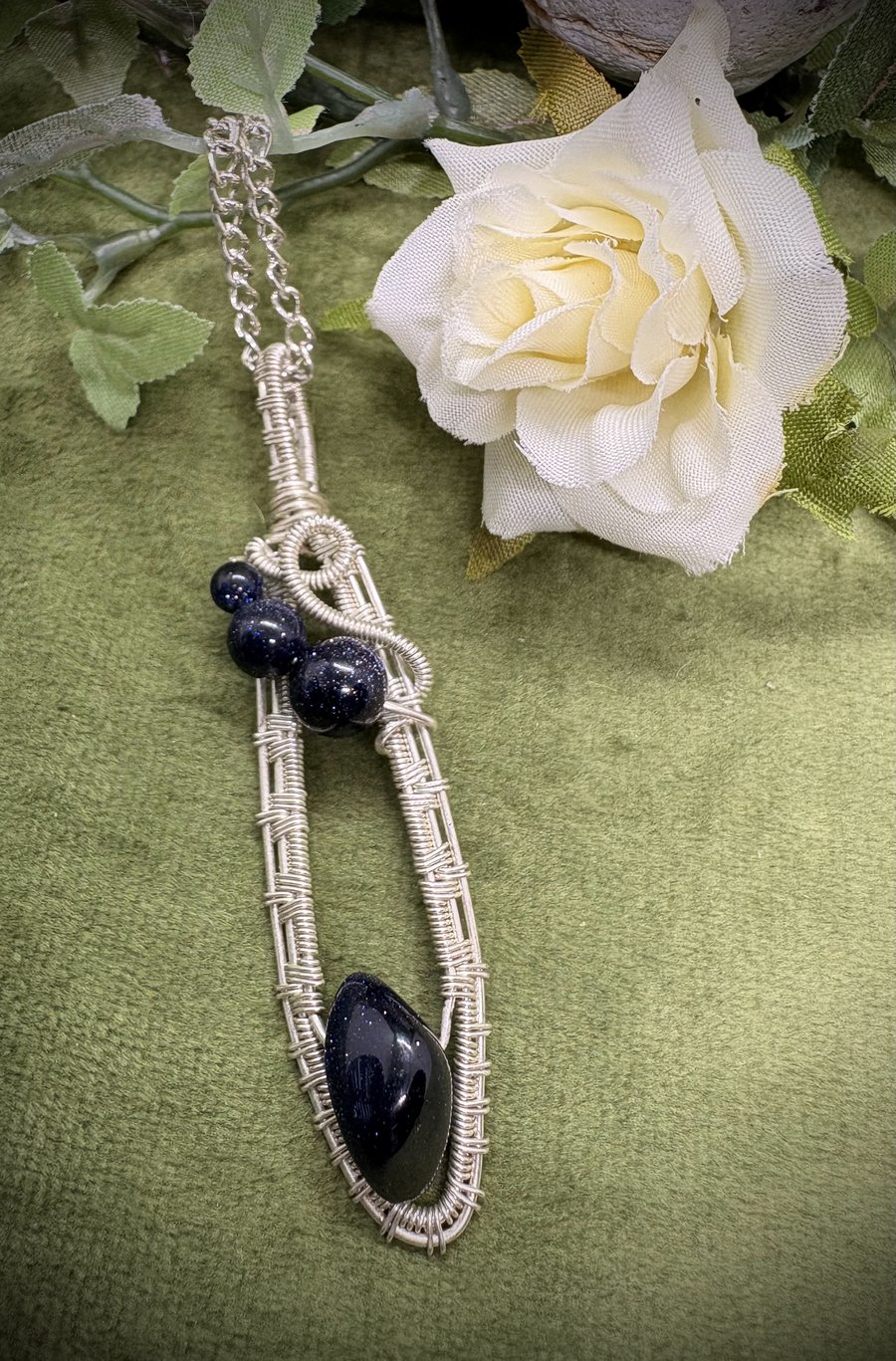 Silver wire wrapped Blue Goldstone pendant