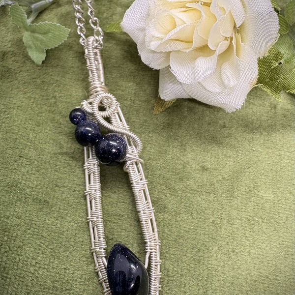 Silver wire wrapped Blue Goldstone pendant
