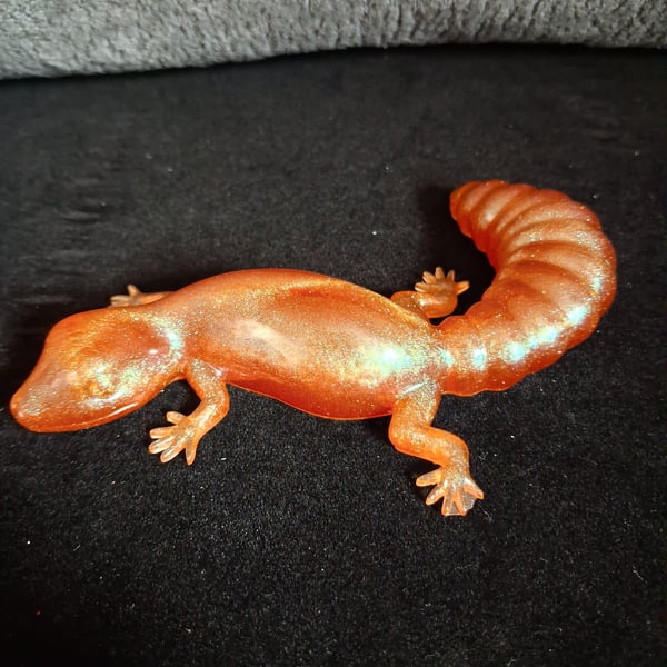 Handmade epoxy resin gecko ornament. Orange shimmer