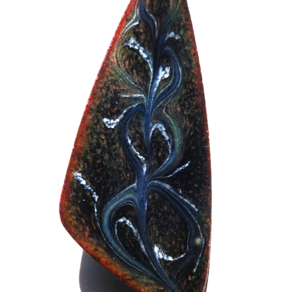 triangular brooch - scrolled dark blue and white on black over clear enamel