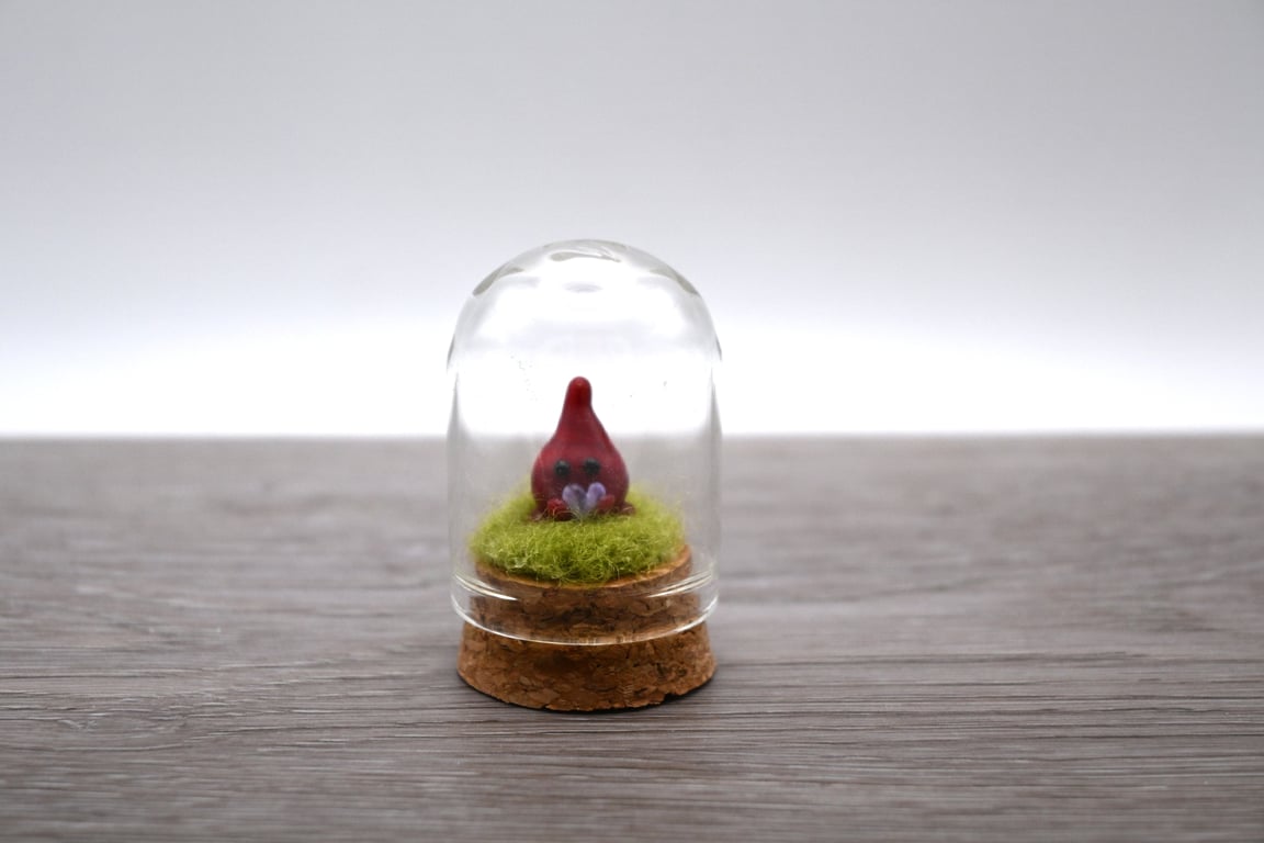 small glass wisp keepsake figure
