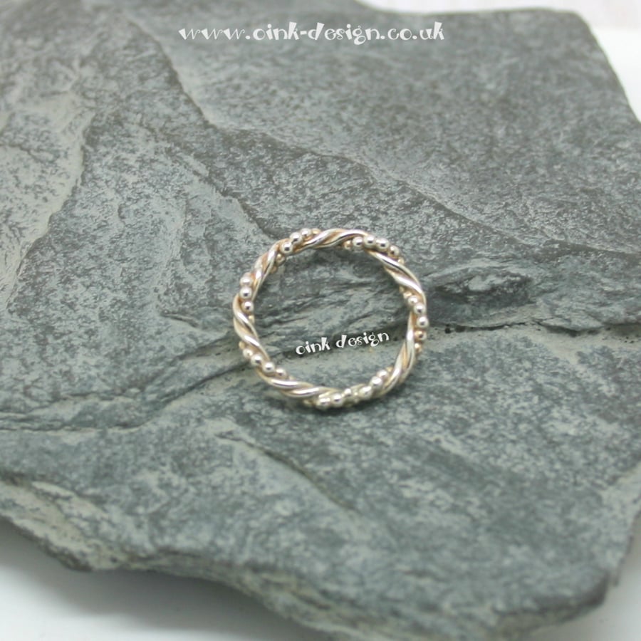 Sterling silver twisted ring size K