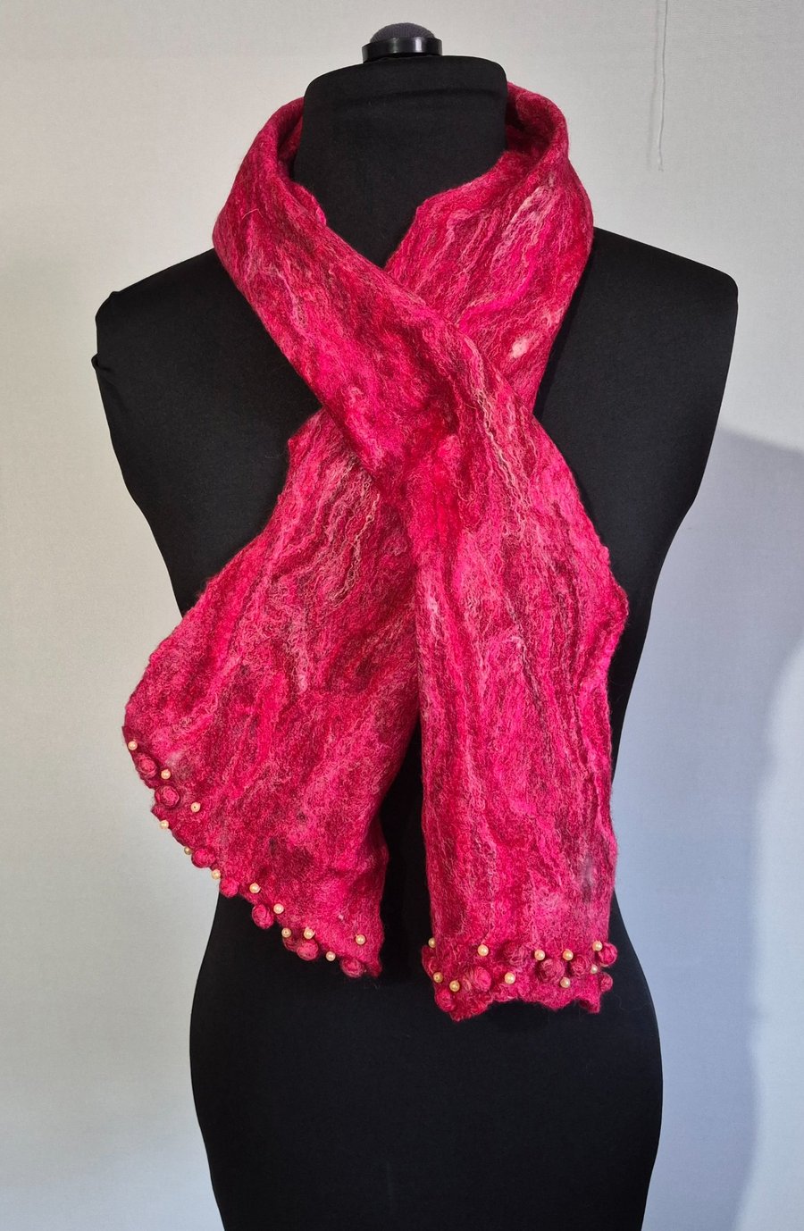 38. Red Hand Felted Short Scarf with Pearl Detailing on Scarf Ends.