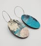 Oval shaped earrings in a watery effect print, blues, white, grey and pink - Image 5