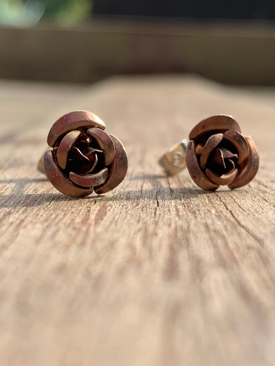 Brown metal rose studs