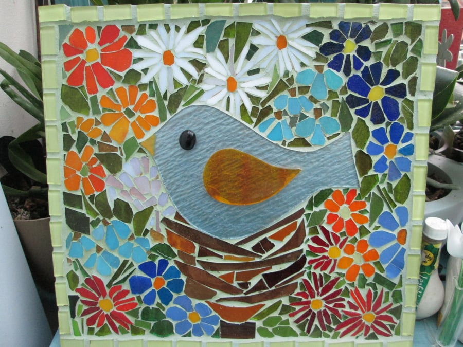 Mosaic Bird on nest in the flowers