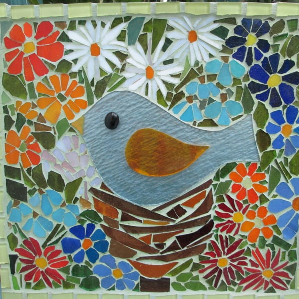 Mosaic Bird on nest in the flowers