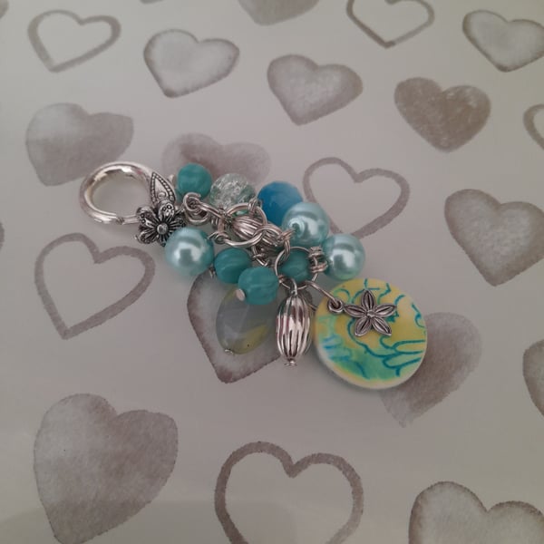 SHADES OF TURQUOISE, TEAL, PALE GREEN AND SILVER HANDBAG CHARM.