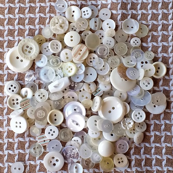 Assorted white buttons