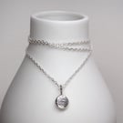 Shimmer silver pebble pendant necklace.