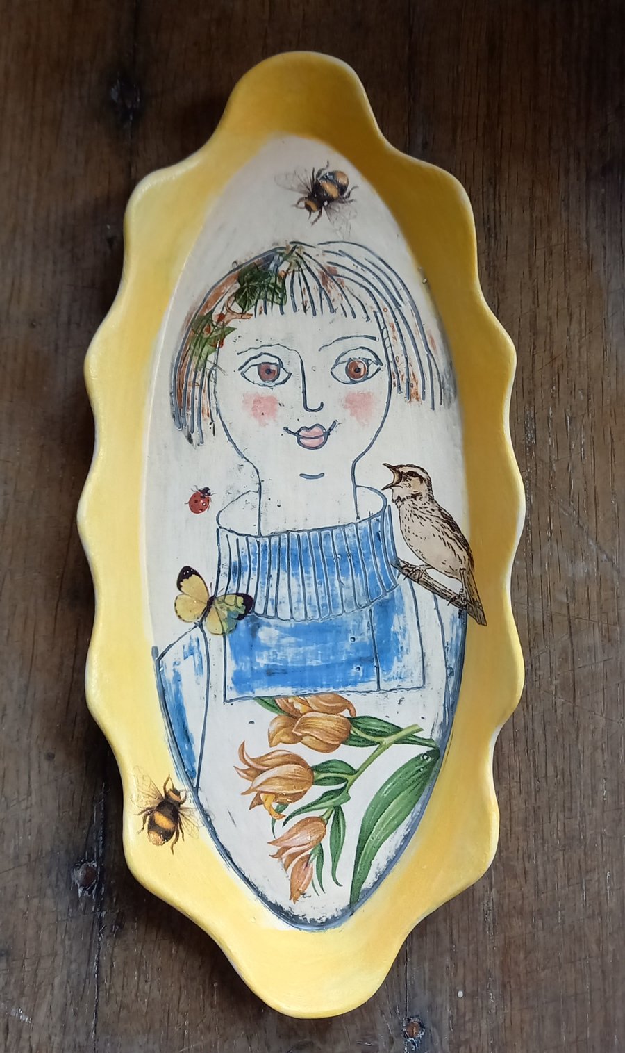 Figurative shallow dish. 