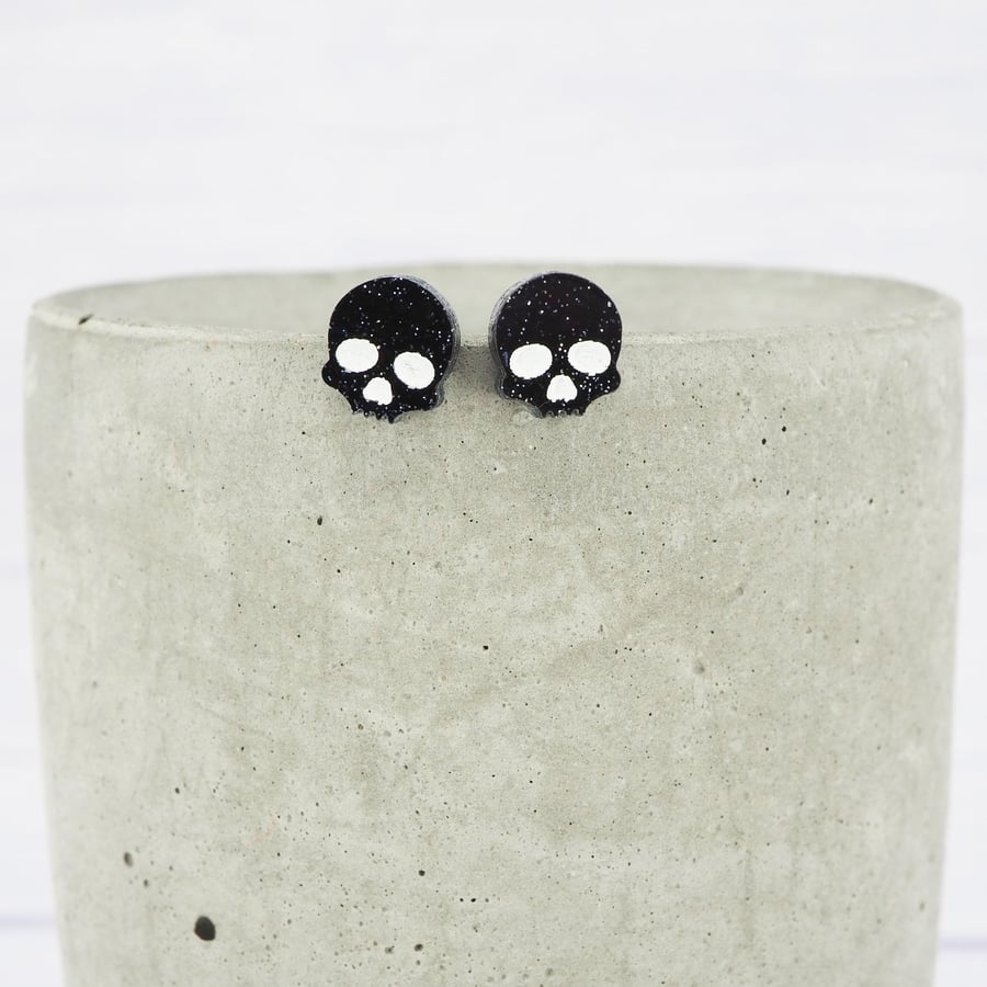 Titanium posts - Black glitter acrylic small skull stud earrings