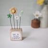 Clay Flowers in a Painted Wood Block 'be a wild flower'