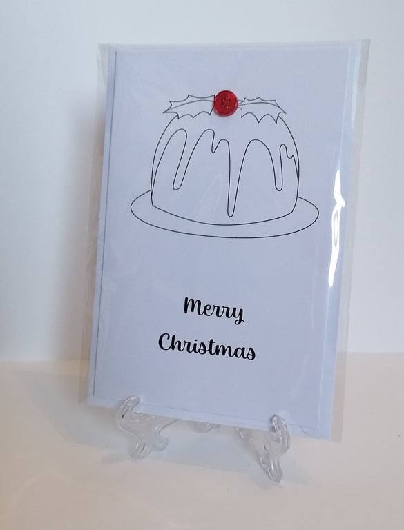 Christmas card with red buttons on a Christmas pudding