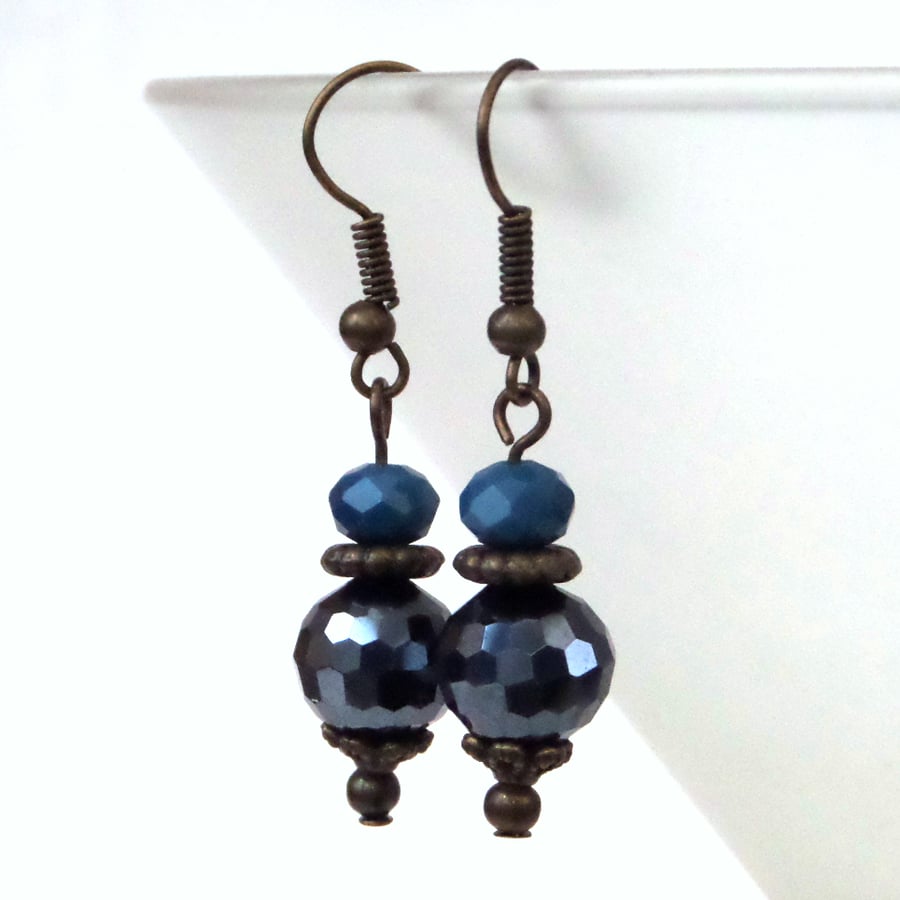 Vintage style bronze earrings with jet blue crystals