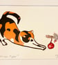 Mounted Christmas cat with bauble reduction lino print  - Image 4