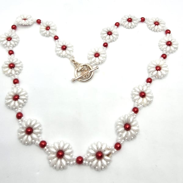 Daisy collection necklace with red faux pearls