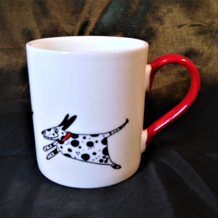 Dalmatians, lots more Dalmatians. Running round a white china mug.