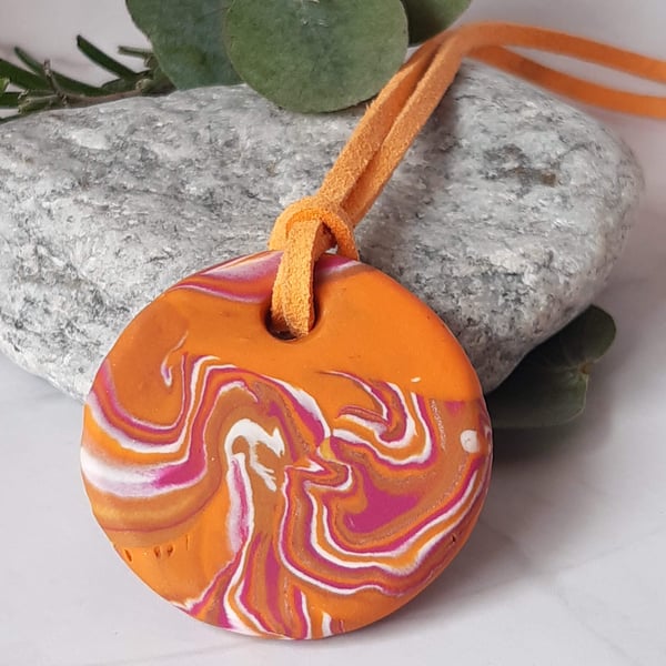 Round vibrant polymer clay pendant