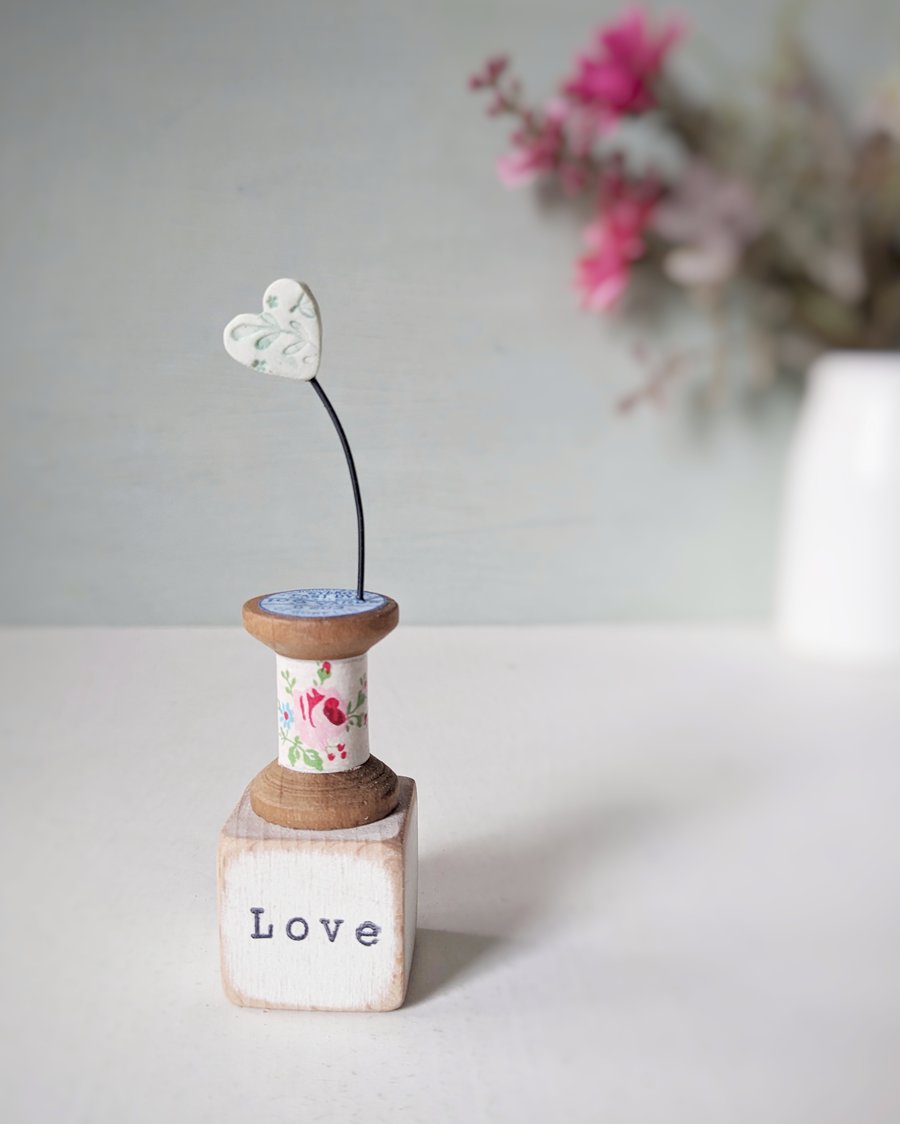 Clay Heart on a Teeny Vintage Bobbin 'love'