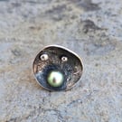 Statement 925 silver ring with patina and cultured natural pearl.