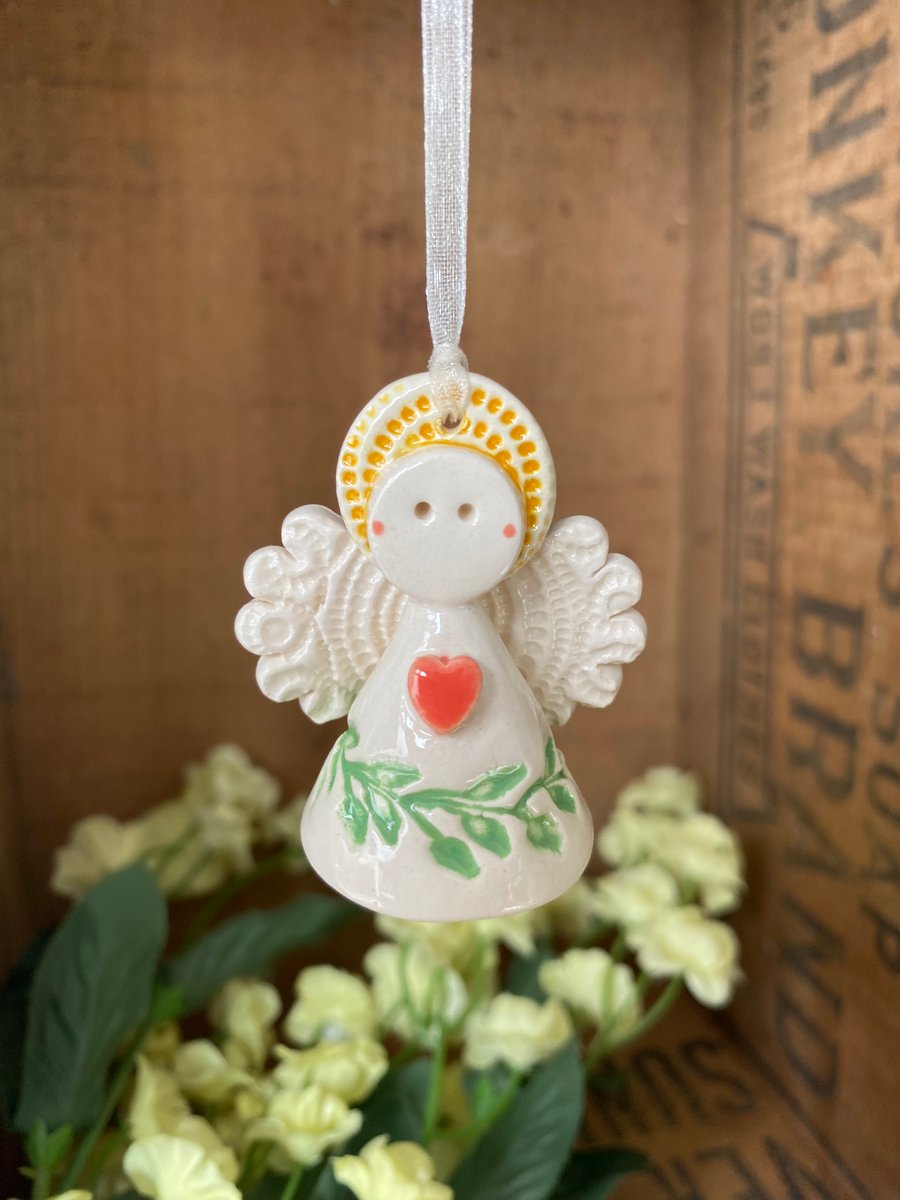 Teeny little ceramic angel