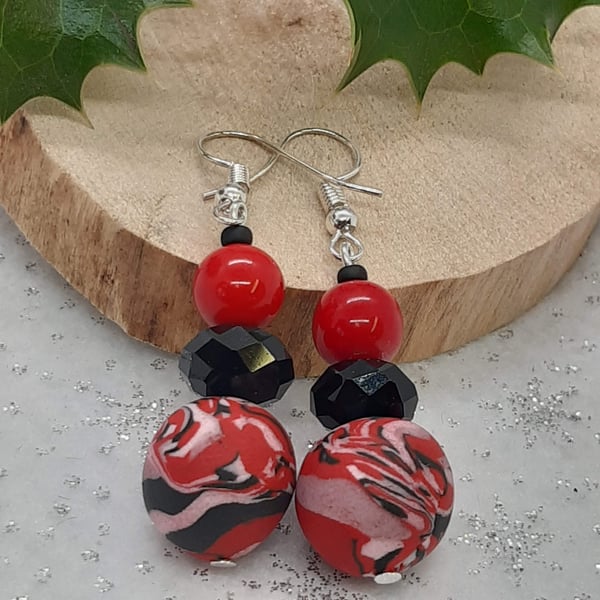 Red and black dangly earrings