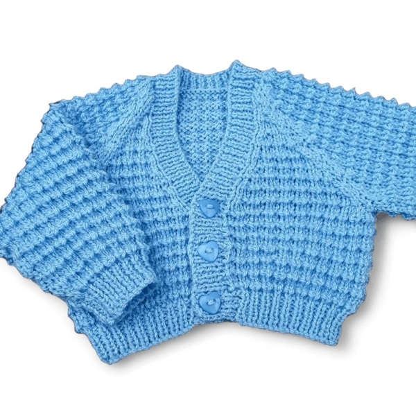 Hand knitted baby cardigan in baby blue, textured pattern  