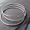 Set of three silver stacking bangles